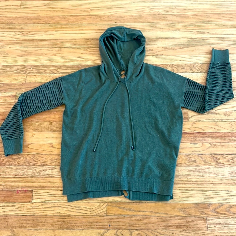 Hooded sweater with fun accents